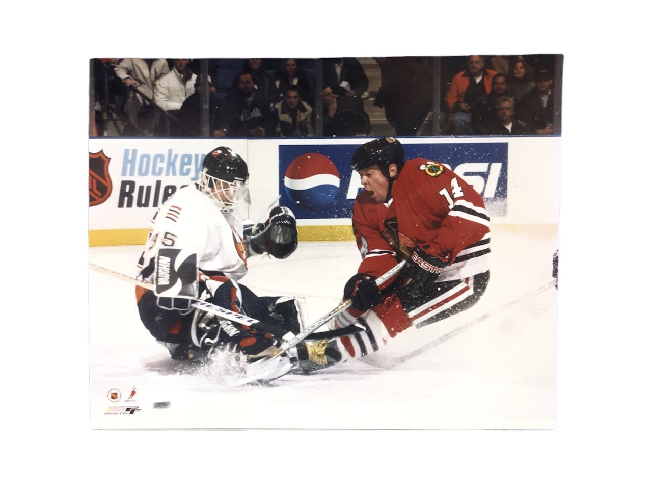 NHL 8x10 Vintage Player Photograph On Ice Theo Fleury Blackhawks