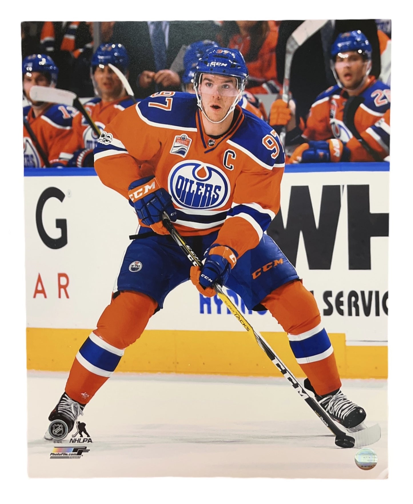NHL 16x20 Player Photograph Puck Connor McDavid Oilers
