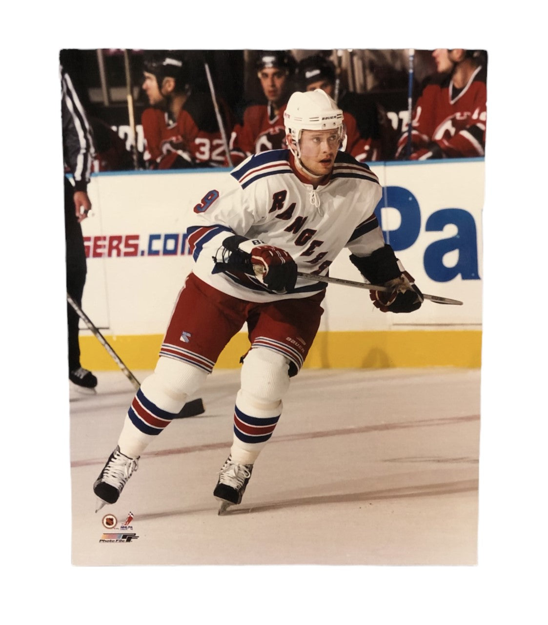 NHL 8X10 Vintage Player Photograph vs rival Pavel Bure Rangers