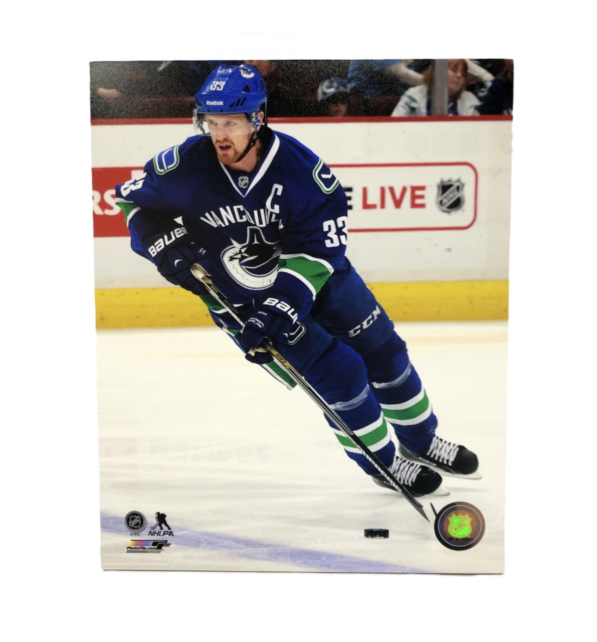 NHL 8x10 Player Photograph Yellow Stick Henrik Sedin Canucks