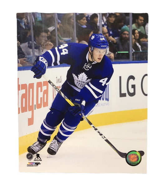 NHL 8x10 Player Photograph Yellow Stick Morgan Rielly Maple Leafs